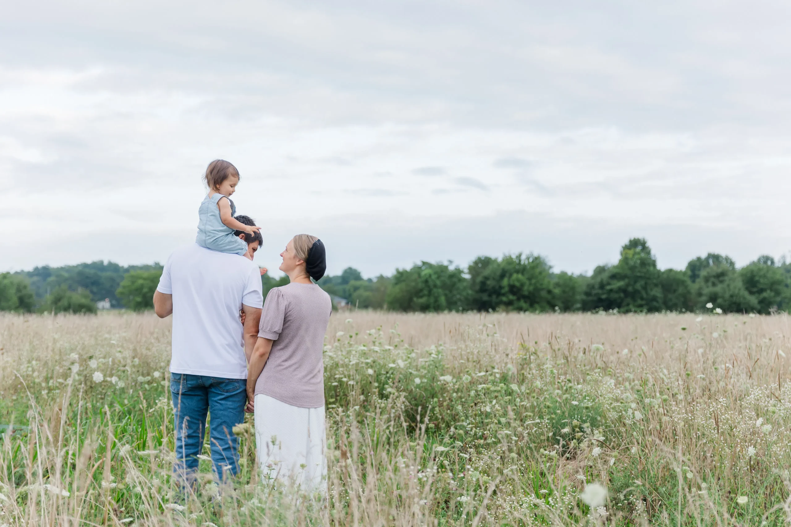 Mennonite family in a field